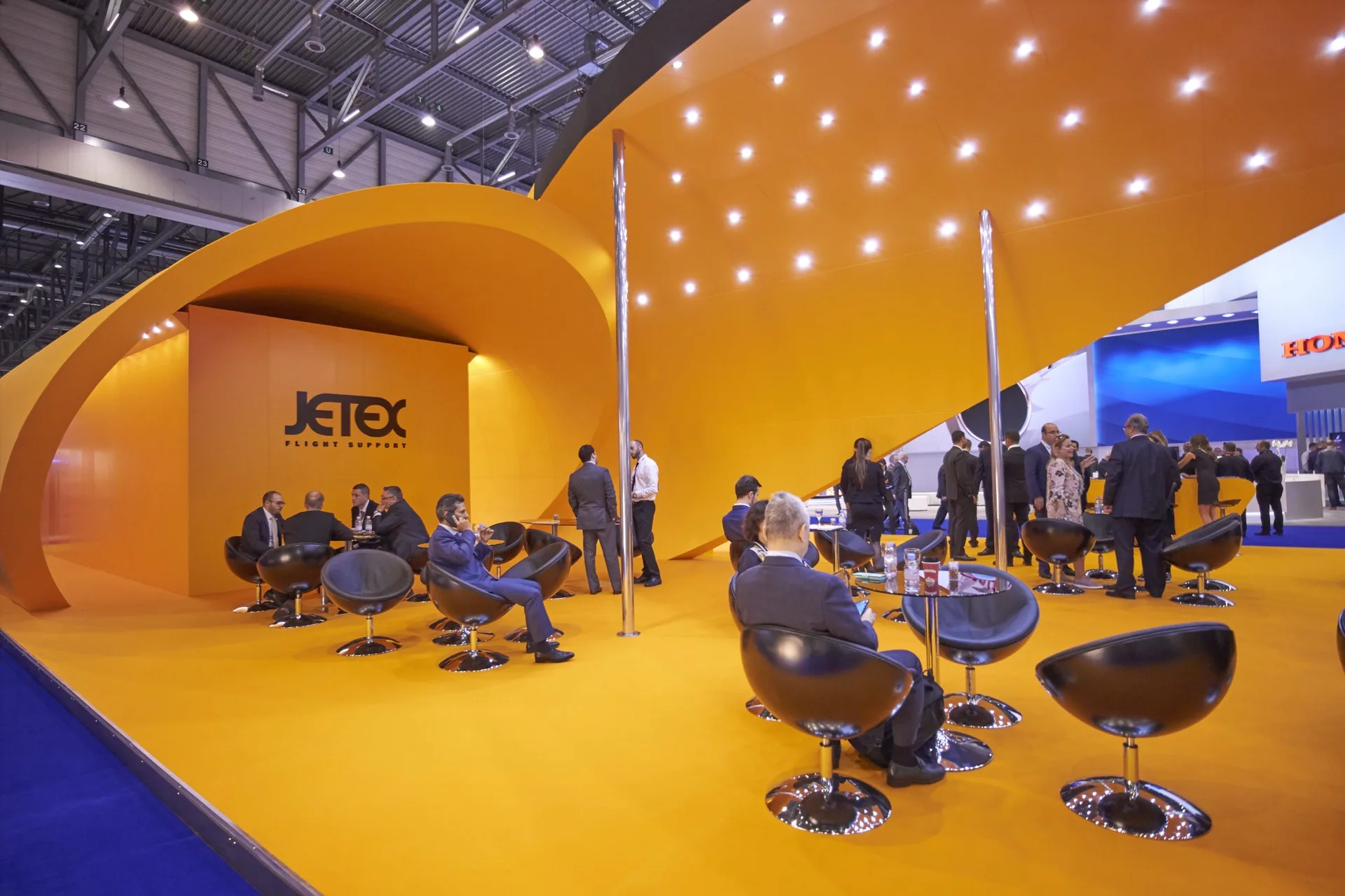 Jetex lounge with visitors networking